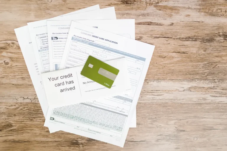 Manchester City face ‘substantial hurdles’ in Premier League appeal Top view of credit card and application documents on wooden surface